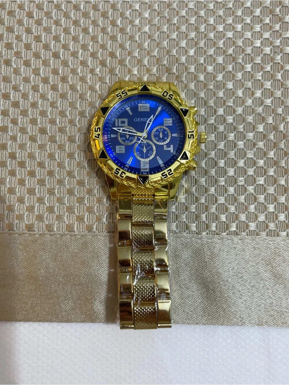 Geneva Gold Tone Watch with Blue Dial and Black Accents